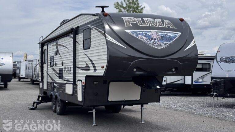 Roulotte de voyage usagée Puma 253FBS 2016 vue extérieure spacieuse avec design moderne